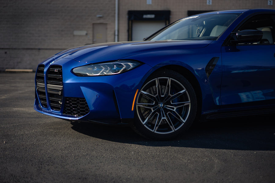 Portimao Blue BMW M3 Competition G80 with the S58 engine, low front three quarter view