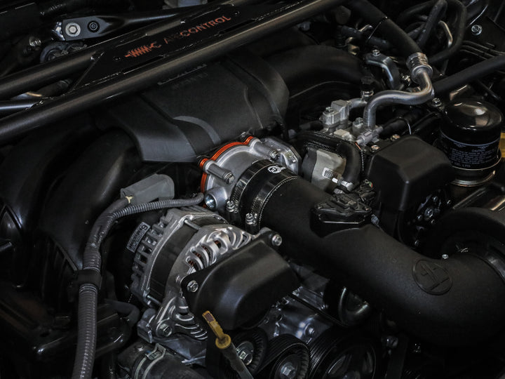 aFe Silver Bullet Throttle Body Spacer - Toyota GR86 / Subaru BRZ 2.4L 2022-2026 - Orange, view 2