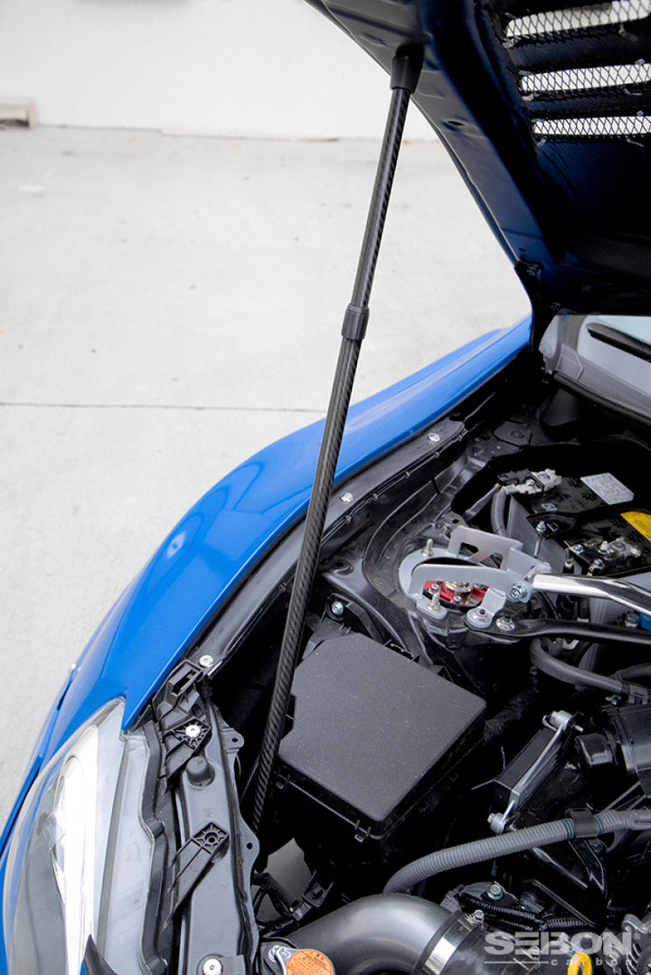 Seibon Carbon Fiber Hood with Truck Prop - OneFastShop