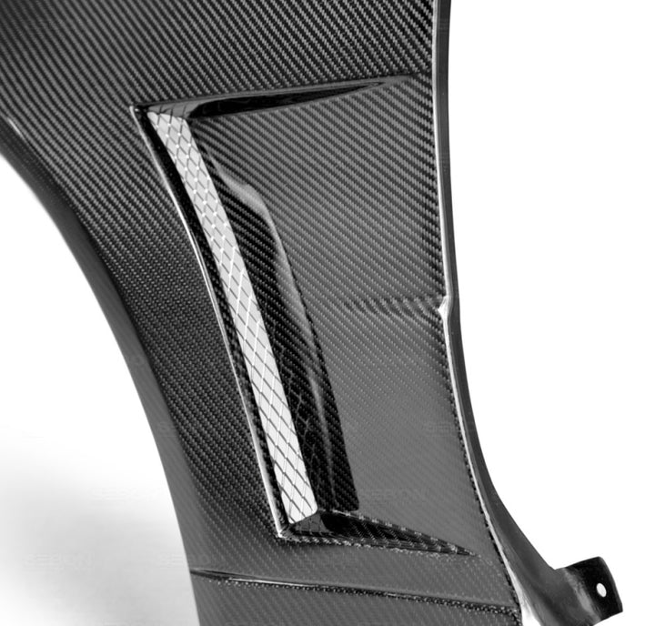 Seibon 99-01 Nissan Skyline R34 NSW-Style Carbon Fiber (Gloss Finish) Fenders (Pair).