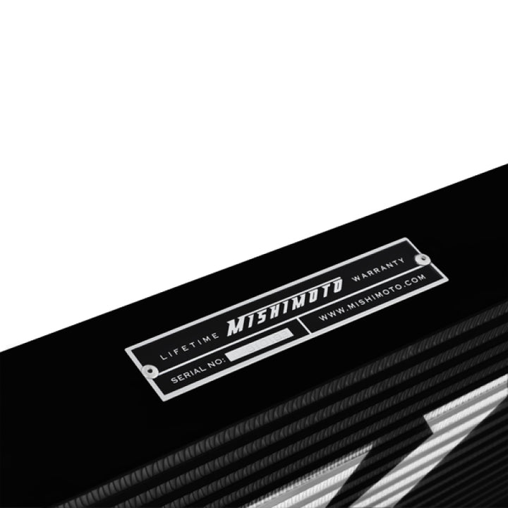 Mishimoto Universal Black R Line Intercooler Overall Size: 31x12x4 Core Size: 24x12x4 Inlet / Outlet.