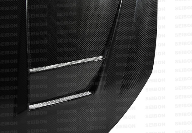 Seibon 10-11 VW Golf GTI 5K/MK6 DV Carbon Fiber Hood w/ Shaved Emblem.