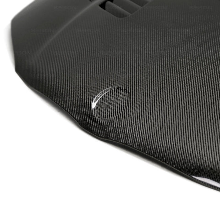 Seibon 08-11 BMW 1 Series (E81/E82) 2DR/HB GTR-Style Carbon Fiber Hood.