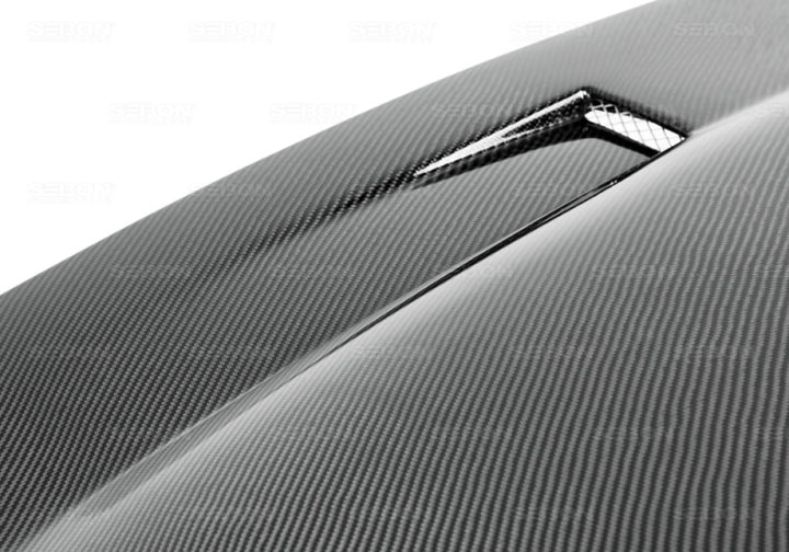 Seibon 03-05 Dodge Neon SRT-4 DV-Style Carbon Fiber Hood.