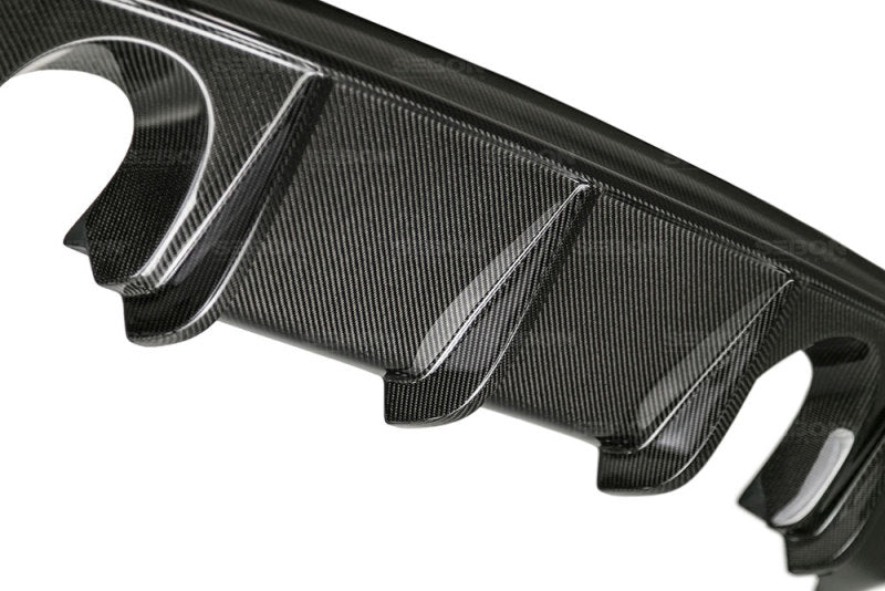 Seibon 15-16 Ford Focus OE-Style Carbon Fiber Rear Bumper Lip.