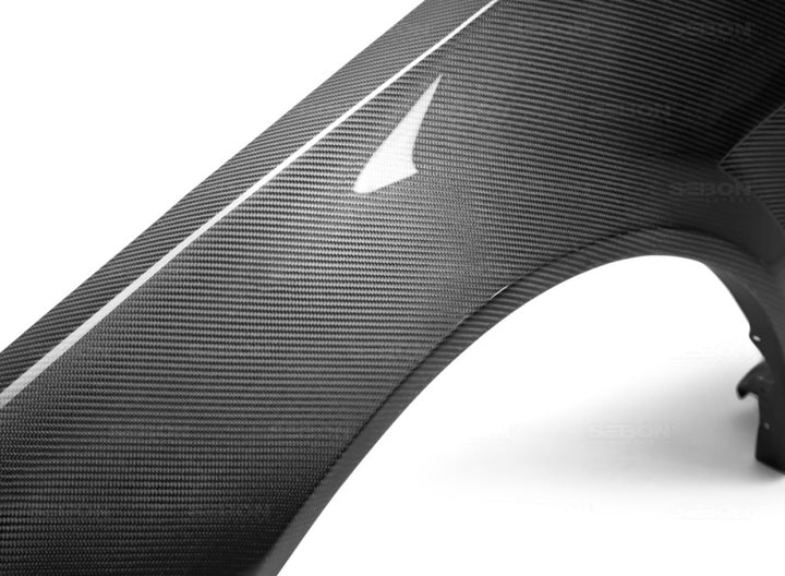 Seibon 99-01 Nissan Skyline R34 NSW-Style Carbon Fiber (Gloss Finish) Fenders (Pair).