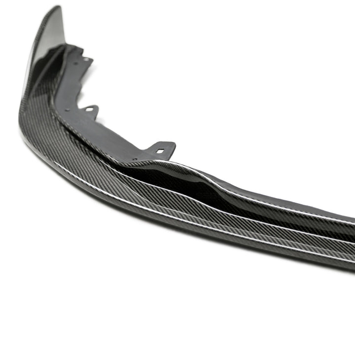 Seibon 19-21 Toyota Corolla Hatchback MB-Style Carbon Fiber Front Lip.